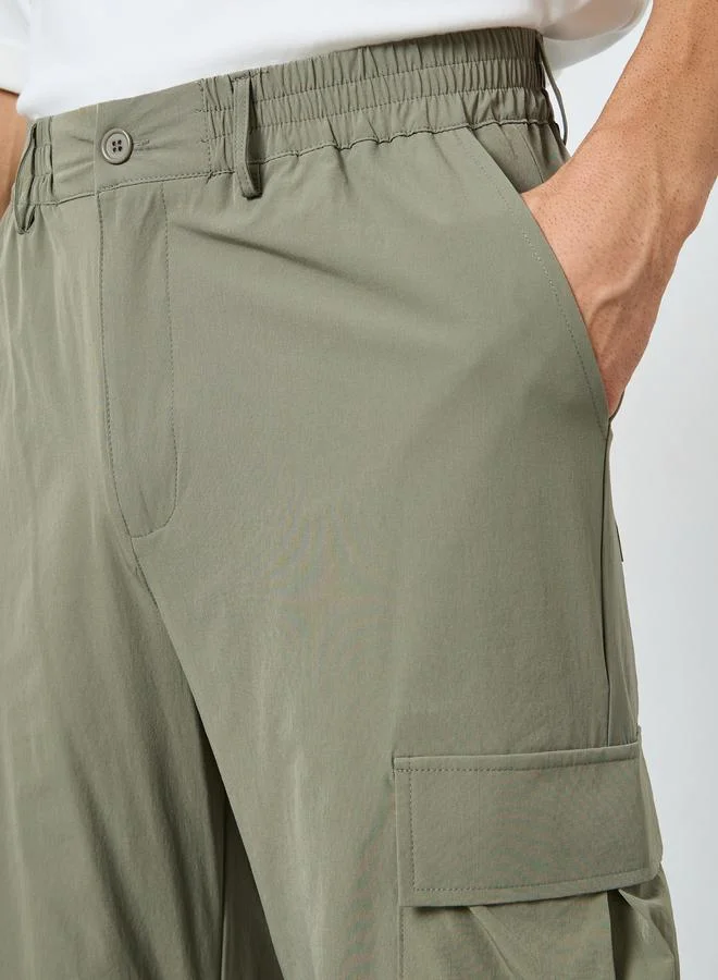 Styli  Men Oversized Front Pleat Cargo Pants for Men | Best Price UAE